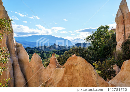 The Organs of Ille sur Tet, or fairy chimneys, in the Pyrenees Orientales, in Catalonia, in Occitanie, France The Organs of Ille sur Tet, or fairy chimneys, in the Pyrenees Orientales, in Catalonia, in Occitanie, France 142781750