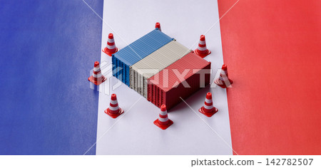 The cargo container ban on the French flag as a conceptual backdrop. Cargo container embargo The cargo container ban on the French flag as a conceptual backdrop. Cargo container embargo 142782507