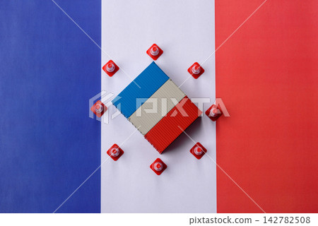 The cargo container ban on the French flag as a conceptual backdrop. Cargo container embargo The cargo container ban on the French flag as a conceptual backdrop. Cargo container embargo 142782508