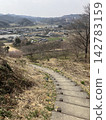 The rural landscape and countryside of Tochigi City as seen from the ruins of Minagawa Castle. 142783159