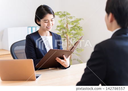 A businessman who makes an interview A businessman who makes an interview 142786557