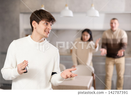 Young guy leaves his family and home after quarrel with relatives Young guy leaves his family and home after quarrel with relatives 142787391