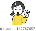 A young woman in casual clothes is holding up three fingers to indicate something. 142787657