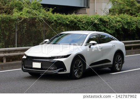 White Japanese sedan image White Japanese sedan image 142787902