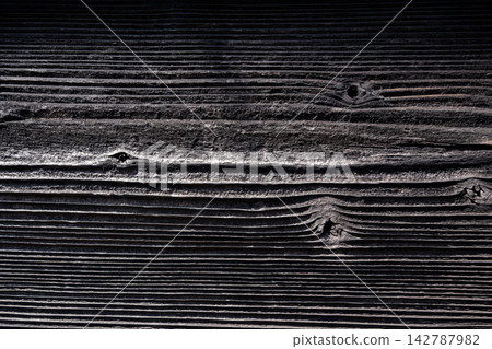 Aged burnt cedar wood background material Aged burnt cedar wood background material 142787982
