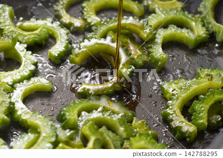 Goya Champuru cooking scene Goya Champuru cooking scene 142788295