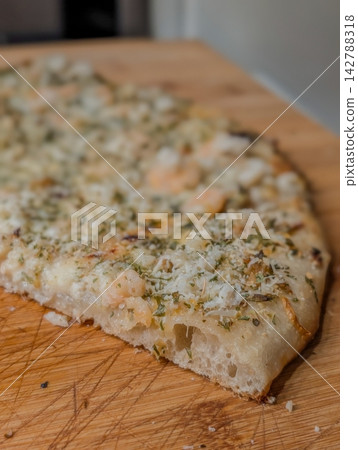 Fresh baked sourdough white clam pie pizza Fresh baked sourdough white clam pie pizza 142788318