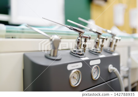 ENT workstation are ready for work. Medications for irrigation and treatment in the ENT office of a modern clinic. ENT workstation are ready for work. Medications for irrigation and treatment in the ENT office of a modern clinic. 142788935
