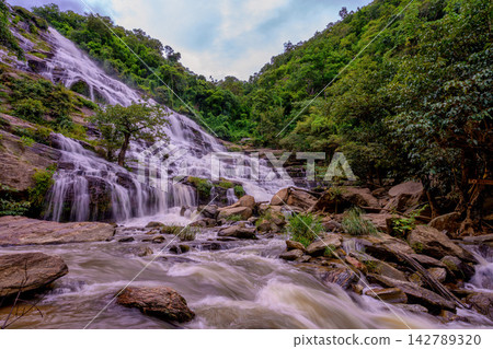 Mae Ya waterfall it beautiful most famous in Doi Inthanon National Park, Chiang mai, Thailand. Mae Ya waterfall it beautiful most famous in Doi Inthanon National Park, Chiang mai, Thailand. 142789320