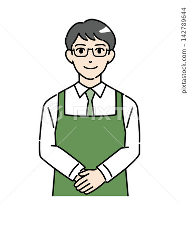 圖1：身穿圍裙的男店員鞠躬。 142789644