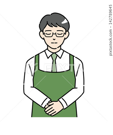 圖 2:身穿圍裙、鞠躬的男店員。 圖 2:身穿圍裙、鞠躬的男店員。 142789645