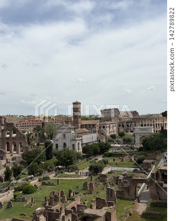 Ancient ruins overlooking the Colosseum at the Roman Forum in Rome, Italy Ancient ruins overlooking the Colosseum at the Roman Forum in Rome, Italy 142789822