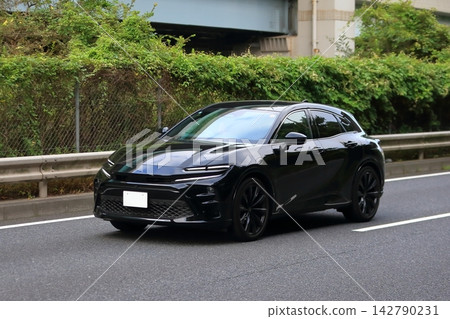Image of a black domestic sports car Image of a black domestic sports car 142790231
