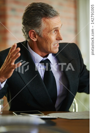 Mature ceo, digital tablet and discussion at table for meeting, battle plan and strategy in corporate workplace. Businessman, talking and conference in office for finances, planning and leadership Mature ceo, digital tablet and discussion at table for meeting, battle plan and strategy in corporate workplace. Businessman, talking and conference in office for finances, planning and leadership 142791005