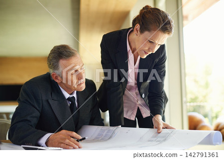Businessman, architect and plans with office, discussion and collaboration for engineering project. Mature woman, man and architecture with teamwork, blueprints and review for construction design Businessman, architect and plans with office, discussion and collaboration for engineering project. Mature woman, man and architecture with teamwork, blueprints and review for construction design 142791361