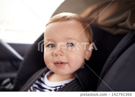 Portrait, toddler boy and car seat in transport, safety and happy kid on road trip. Childhood development, chair and secure baby in motor vehicle, travel and smile on face of son excited for ride Portrait, toddler boy and car seat in transport, safety and happy kid on road trip. Childhood development, chair and secure baby in motor vehicle, travel and smile on face of son excited for ride 142791368