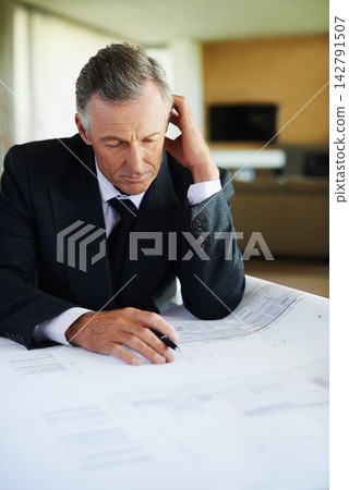 Stress, blueprint and mature man in office, thinking and planning for risk of investment in property. Real estate, realtor and executive of business, reading and anxiety of paperwork for budget Stress, blueprint and mature man in office, thinking and planning for risk of investment in property. Real estate, realtor and executive of business, reading and anxiety of paperwork for budget 142791507