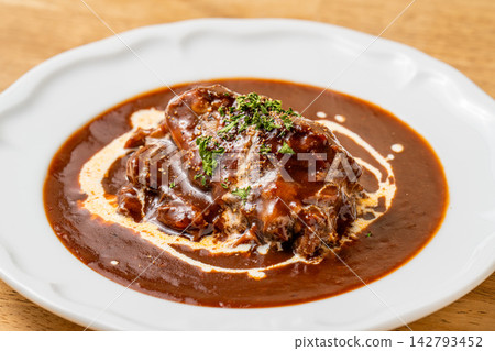 Rich beef tongue stew, simmered slowly until tender. Rich beef tongue stew, simmered slowly until tender. 142793452