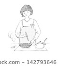 A woman in an apron cooking in a frying pan. 142793646