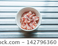 Minced pork in a small bowl. 142796360