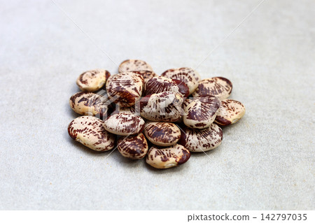 Raw lima beans on grey background. Raw lima beans on grey background. 142797035