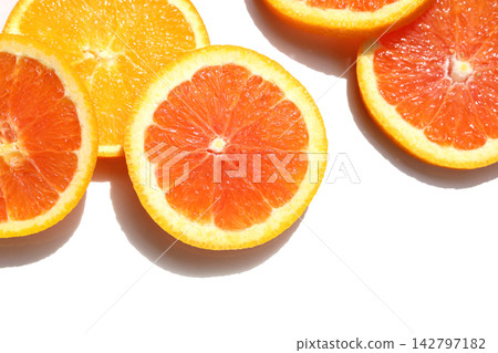 Juicy orange slices on a white background. Juicy orange slices on a white background. 142797182