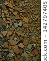 Abstract Texture of Broken Ceramic Tiles and Shards 142797405