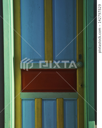 colorful door of an old house colorful door of an old house 142797829