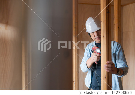 Workers working at construction sites Workers working at construction sites 142798656