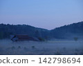 Abandoned house shrouded in fog 142798694