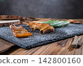 grilled chicken wings skewers with seasoning 142800160