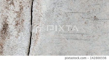 Weathered and cracked gray concrete wall background Weathered and cracked gray concrete wall background 142800336