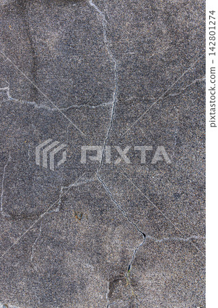 The texture of old concrete that has cracked due to age-related deterioration. The texture of old concrete that has cracked due to age-related deterioration. 142801274