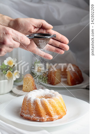 Easter cakes on a white wooden table. Easter cakes on a white wooden table. 142802209