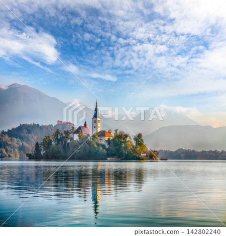 Sunny day view on popular tourist destination Bled lake. Sunny day view on popular tourist destination Bled lake. 142802240