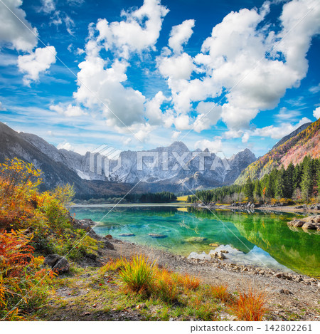 Fabulous view of Fusine lake with Mangart peak on background. 142802261