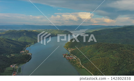 Danube river and mountains in Djerdap National Park at sunset Danube river and mountains in Djerdap National Park at sunset 142802838