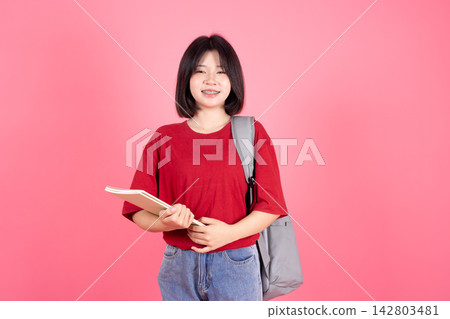 Asian Female Student Holding Notebook Backpack College Campus Education Concept Studio Asian Female Student Holding Notebook Backpack College Campus Education Concept Studio 142803481