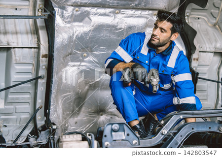 Hispanic Mechanic Truck Car Service Maintenance Auto Repair Garage Workshop Technician Worker Hispanic Mechanic Truck Car Service Maintenance Auto Repair Garage Workshop Technician Worker 142803547