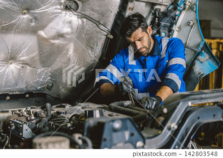 Hispanic Mechanic Truck Car Service Maintenance Auto Repair Garage Workshop Technician Worker Hispanic Mechanic Truck Car Service Maintenance Auto Repair Garage Workshop Technician Worker 142803548