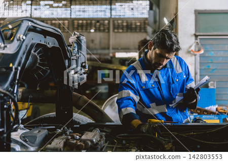Hispanic Mechanic Truck Car Service Maintenance Auto Repair Garage Workshop Technician Worker Hispanic Mechanic Truck Car Service Maintenance Auto Repair Garage Workshop Technician Worker 142803553