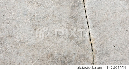 Cracked gray concrete wall texture Cracked gray concrete wall texture 142803654