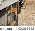 Footrest for climbing onto and off a truck bed: Image of accident prevention and safety inspection. 142804442