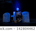 Skeleton in Halloween cemetery blue smoke black background 142804462