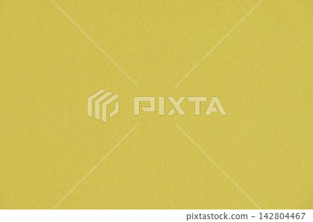 A close-up background material of warm mustard-colored felt fabric, with a texture that blends well with autumn and winter designs. A close-up background material of warm mustard-colored felt fabric, with a texture that blends well with autumn and winter designs. 142804467
