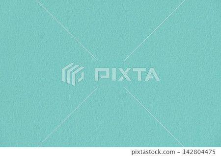 Mint green felt fabric close-up background material, perfect texture for elegant crafts and spring designs. Mint green felt fabric close-up background material, perfect texture for elegant crafts and spring designs. 142804475