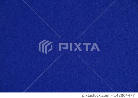A deep royal blue felt fabric close-up background material, perfect texture for winter designs and crafts. A deep royal blue felt fabric close-up background material, perfect texture for winter designs and crafts. 142804477