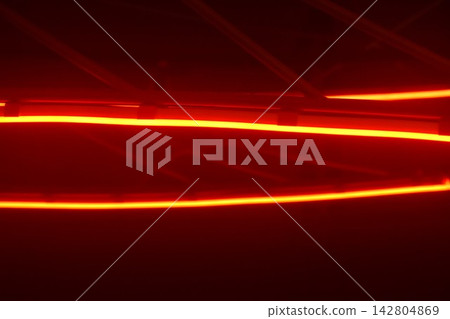 long red LED light lamp flashing on rooftop in black background long red LED light lamp flashing on rooftop in black background 142804869