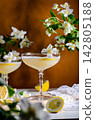 still life with orange juice and flowers	 142805188