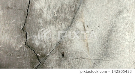 Cracked gray cement and concrete wall texture background Cracked gray cement and concrete wall texture background 142805453